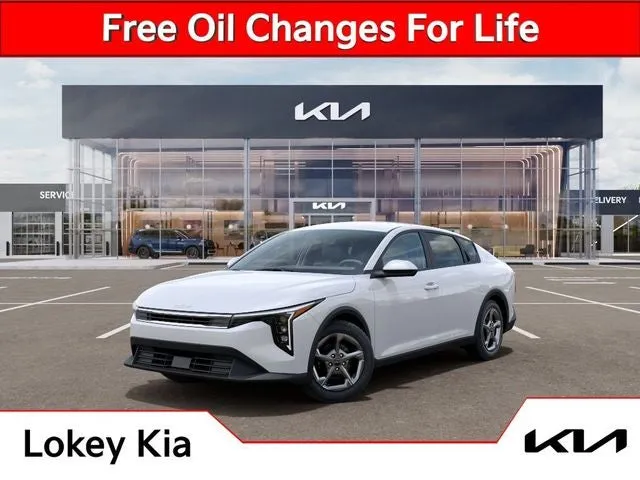 2026 Kia K4 LXS in Snow White Pearl — front three-quarter view