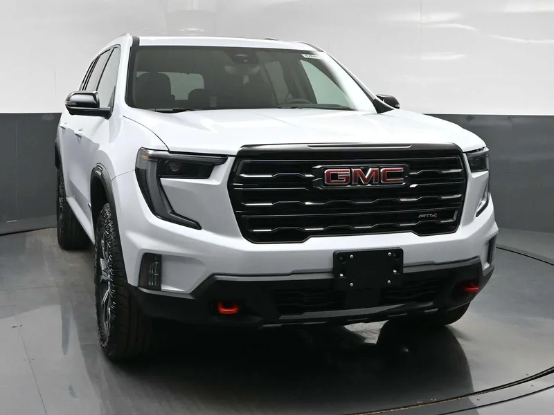 2026 GMC Acadia AT4 in Glacier White Tricoat — front three-quarter view
