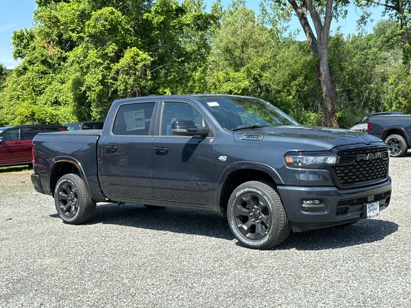 2026 RAM 1500 Big Horn in Forged Blue Metallic — front three-quarter view