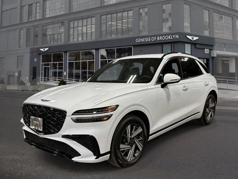 2026 Genesis GV70 3.5T Sport Advanced in Alta White — front three-quarter view