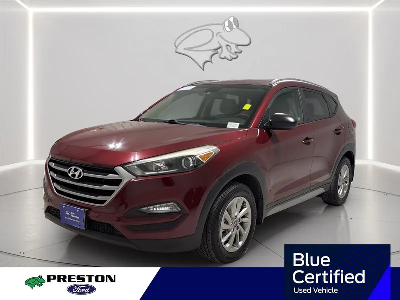 2017 Hyundai Tucson SE in Ruby Wine — front three-quarter view