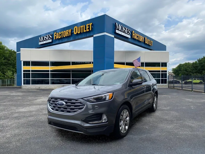 2024 Ford Edge Titanium in Carbonized Gray — front three-quarter view