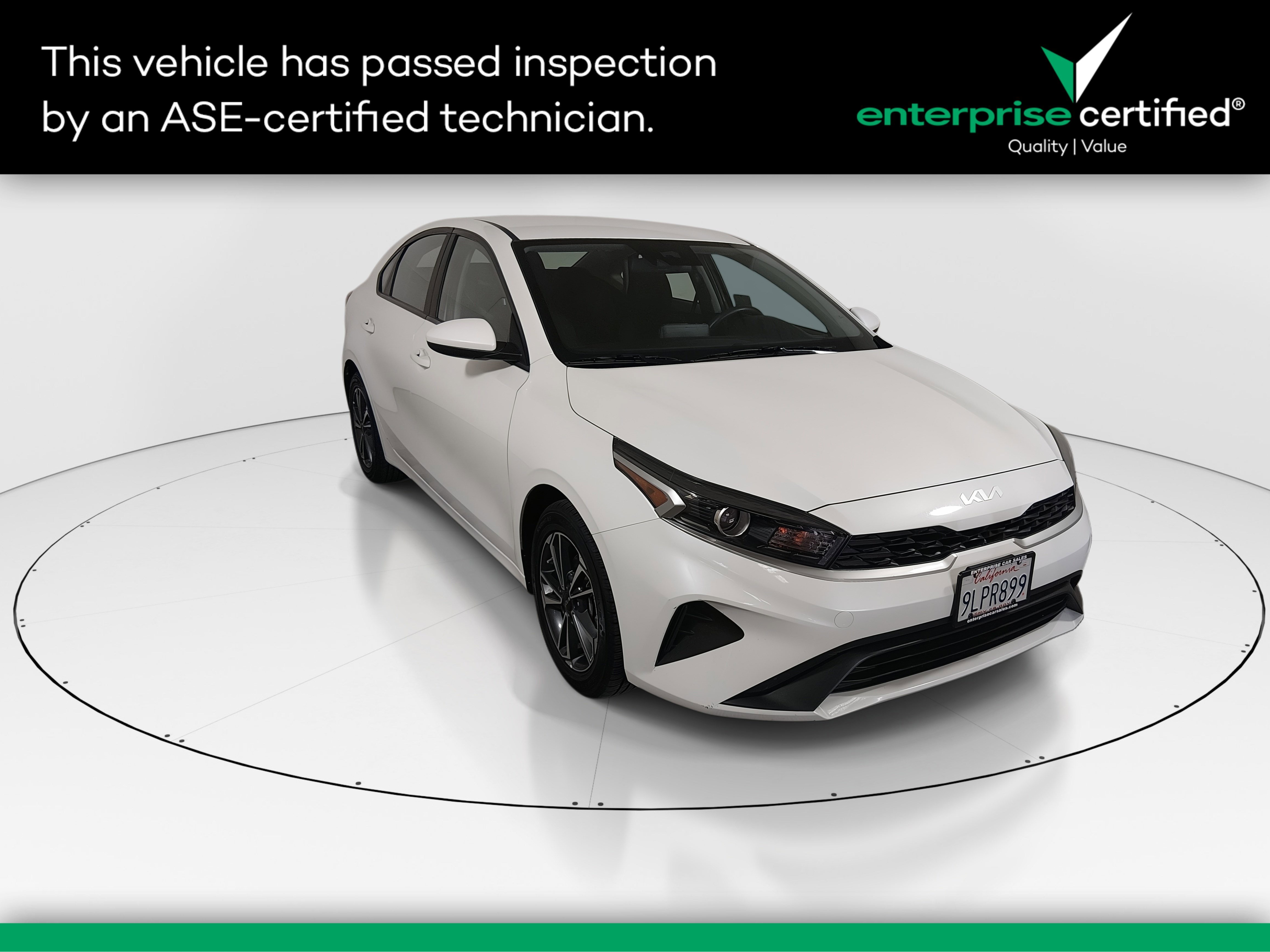 2024 Kia Forte LXS IVT — front three-quarter view