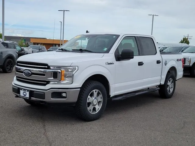 2019 Ford F-150 XLT in Oxford White — front three-quarter view