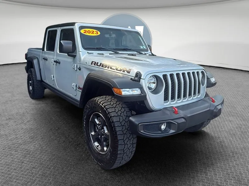 2023 Jeep Gladiator Rubicon 4x4 in Silver Zynith Clearcoat — front three-quarter view