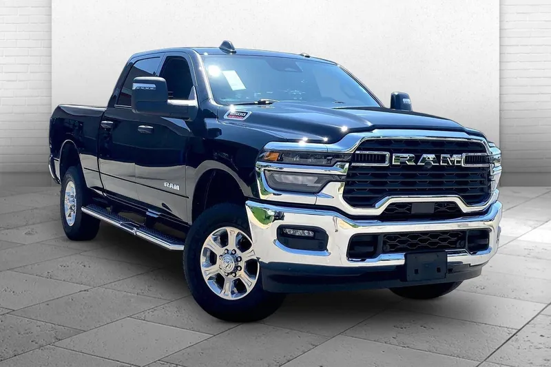 2026 RAM 2500 Big Horn Crew Cab 4x4 6'4' Box in Diamond Black Crystal Pearlcoat — front three-quarter view