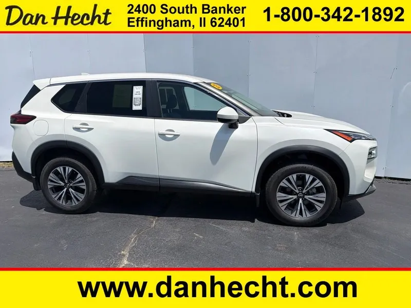 2023 Nissan Rogue SV in Pearl White — front three-quarter view