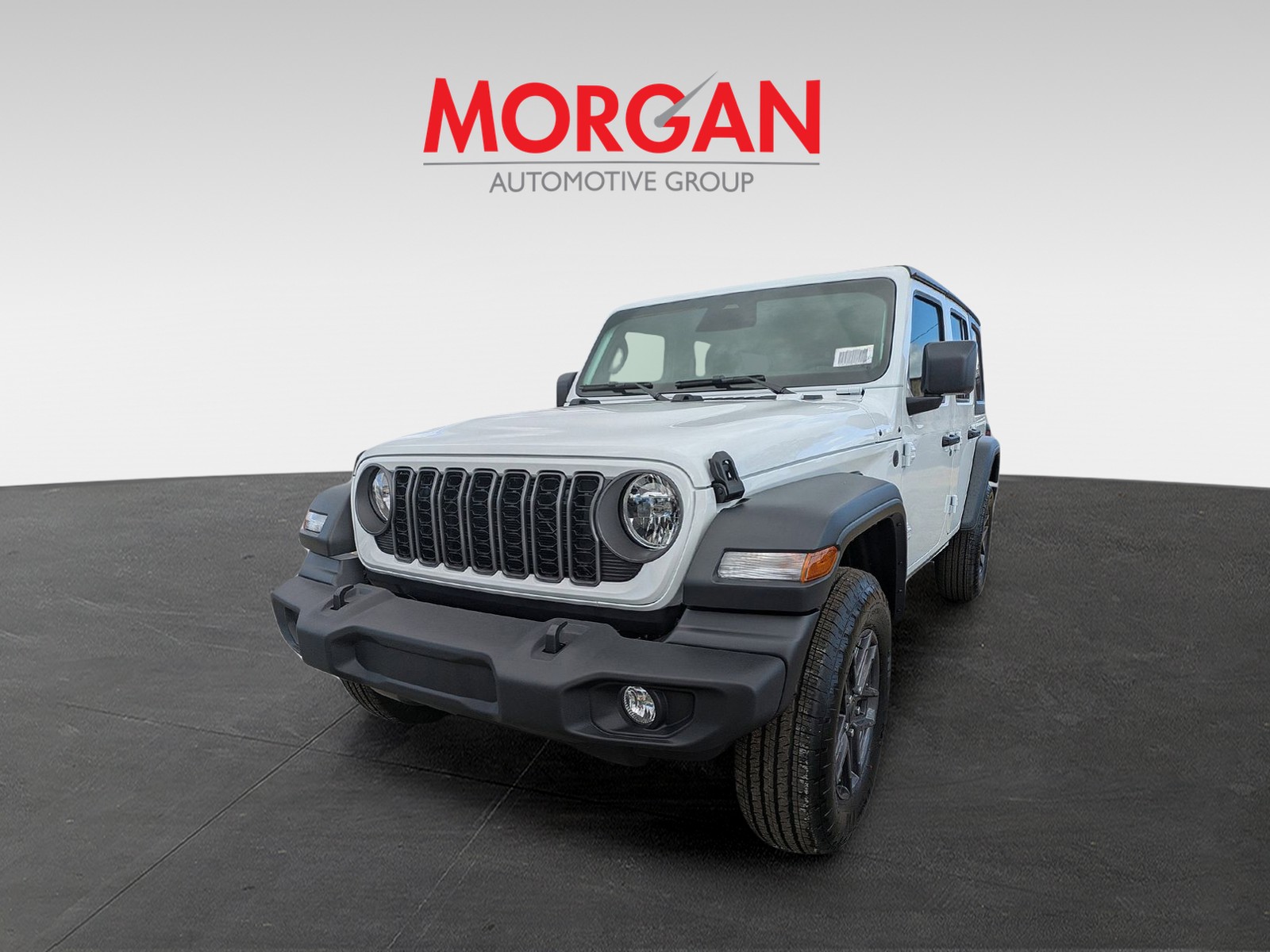 2026 Jeep Wrangler Sport S in Bright White Clearcoat — front three-quarter view
