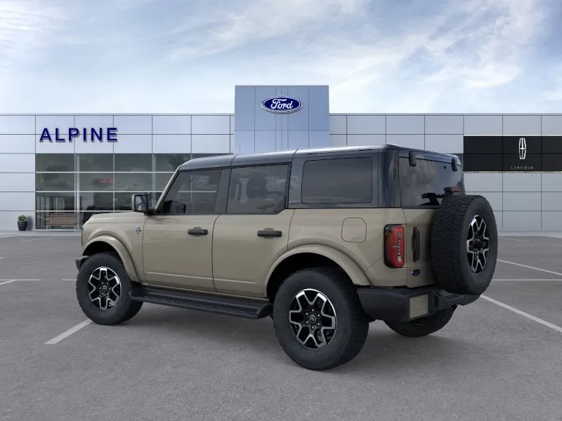 2026 Ford Bronco Outer Banks in Desert Sand — front three-quarter view