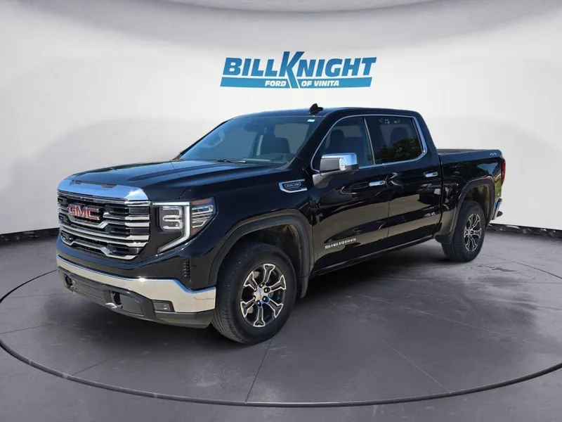 2025 GMC Sierra 1500 SLT in Onyx Black — front three-quarter view