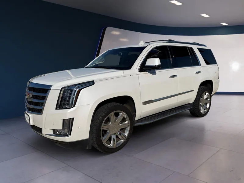 2019 Cadillac Escalade Luxury in Crystal White Tricoat — front three-quarter view
