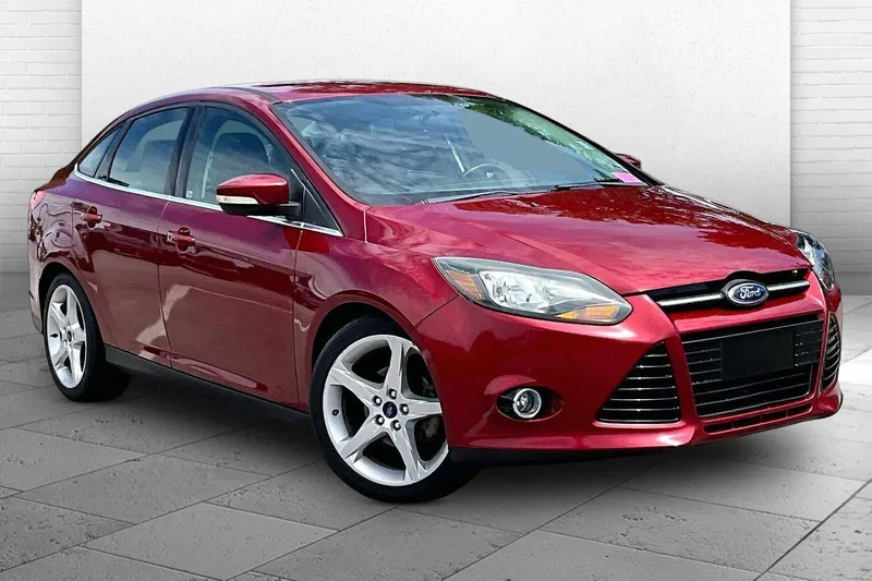 2013 Ford Focus Titanium in Ruby Red Metallic — front three-quarter view