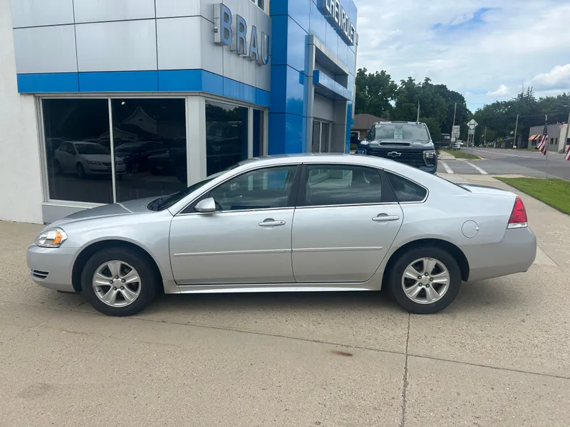 2016 Chevrolet Impala LS in Silver Ice Metallic — front three-quarter view