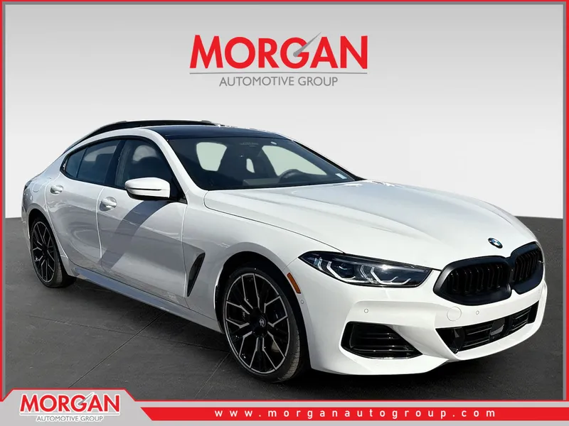 2026 BMW 8 Series 840i in Alpine White — front three-quarter view