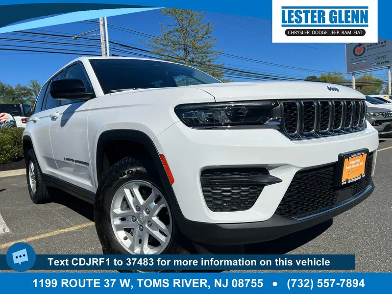 2023 Jeep Grand Cherokee Laredo in Bright White Clearcoat — front three-quarter view