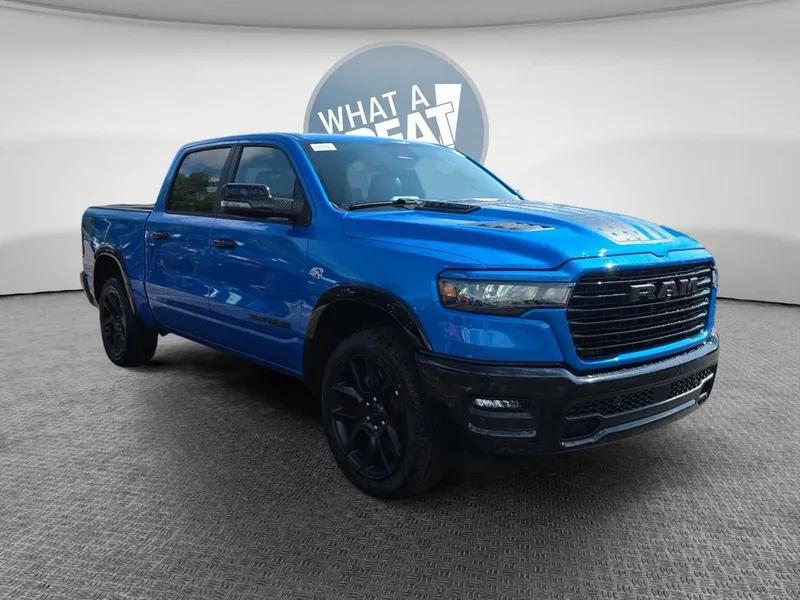 2026 RAM 1500 Laramie in Hydro Blue Pearlcoat — front three-quarter view
