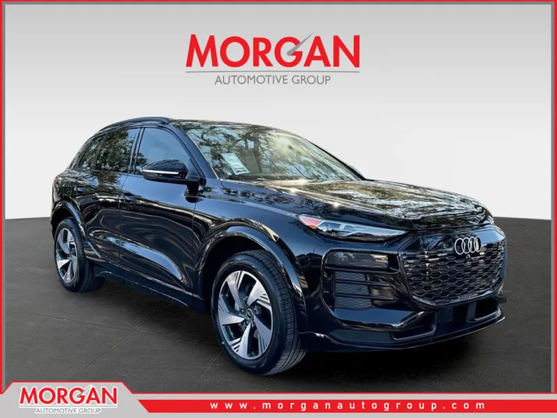 2025 Audi Q6 e-tron Premium in Mythos Black Metallic — front three-quarter view