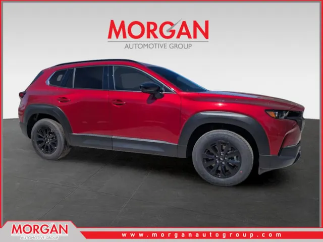 2026 Mazda CX-50 Hybrid Premium in Soul Red Crystal Metallic — front three-quarter view