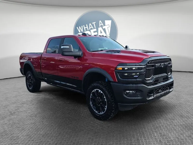 2026 RAM 2500 Rebel in Molten Red Pearlcoat — front three-quarter view