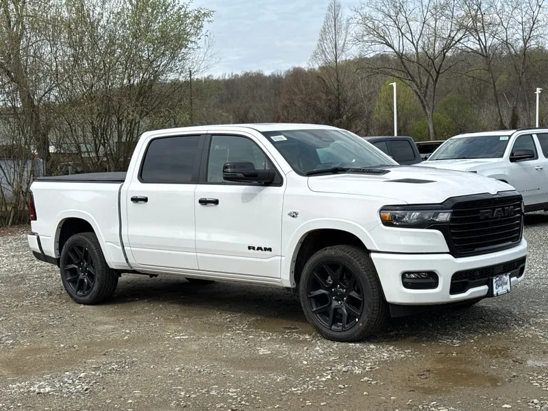 2026 RAM 1500 Laramie in Bright White Clearcoat — front three-quarter view