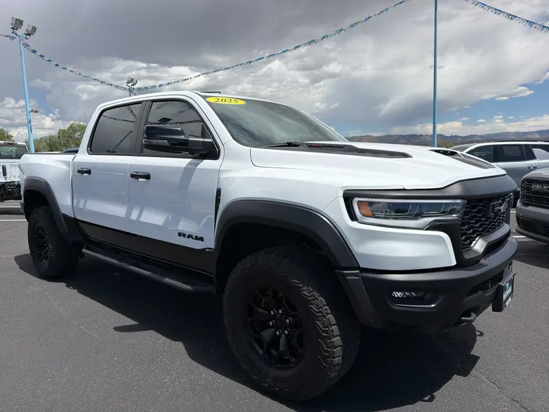 2025 RAM 1500 RHO in White — front three-quarter view