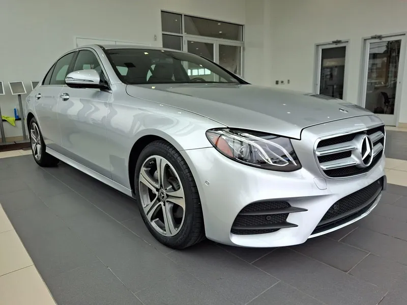 2019 Mercedes-Benz E-Class E 300 4MATIC® Sedan in Diamond Silver Metallic — front three-quarter view