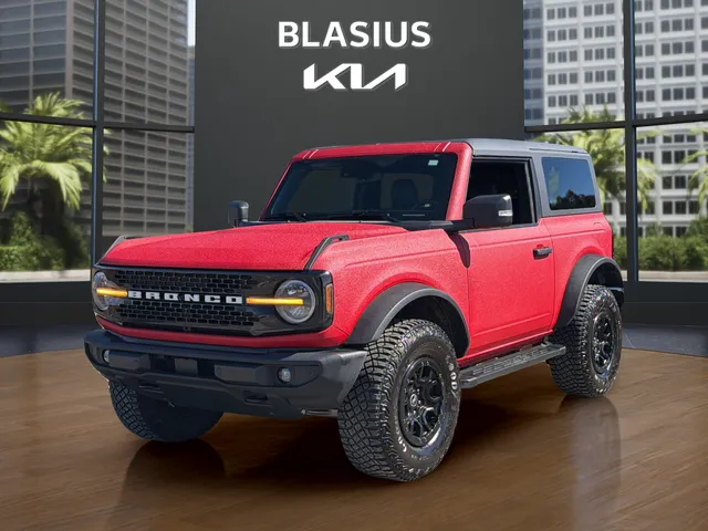 2022 Ford Bronco Wildtrak in Red — front three-quarter view