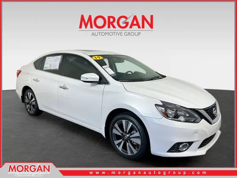 2019 Nissan Sentra SL in Aspen White Tricoat — front three-quarter view