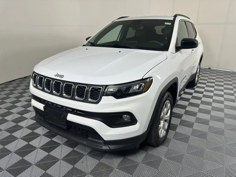 2024 Jeep Compass Latitude in White — front three-quarter view