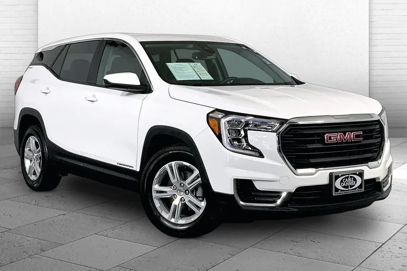 2024 GMC Terrain SLE in Summit White — front three-quarter view