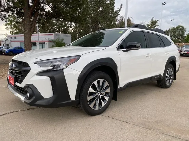 2025 Subaru Outback Limited in Crystal White Pearl — front three-quarter view
