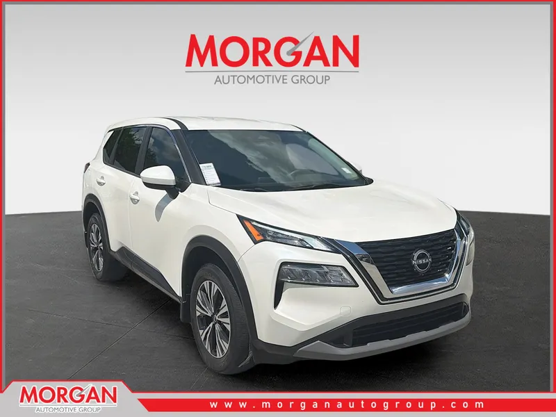 2023 Nissan Rogue SV in Pearl White Tricoat — front three-quarter view