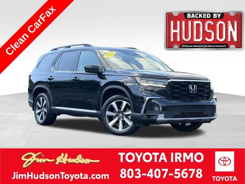 2023 Honda Pilot Elite in Crystal Black Pearl — front three-quarter view