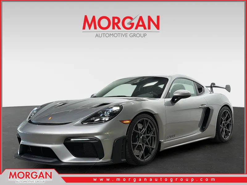 2025 Porsche 718 Cayman GT4 RS in GT Silver Metallic — front three-quarter view
