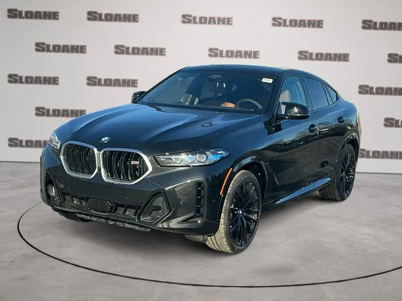 2026 BMW X6 M60i in Black Sapphire Metallic — front three-quarter view