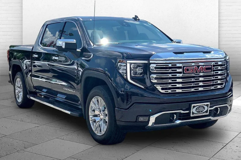 2023 GMC Sierra 1500 Denali in Titanium Rush Metallic — front three-quarter view