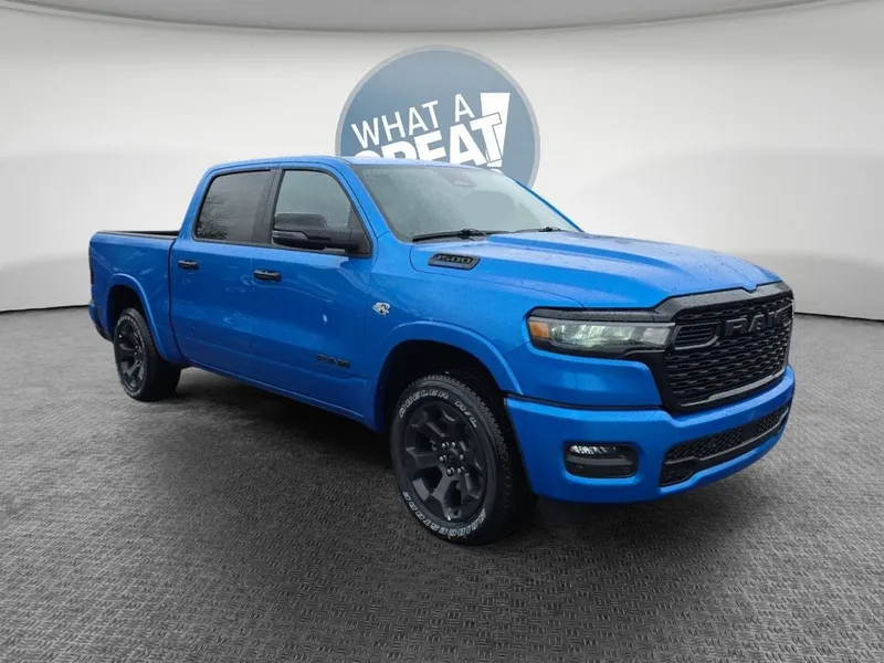 2026 RAM 1500 Big Horn/Lone Star in Hydro Blue Pearlcoat — front three-quarter view