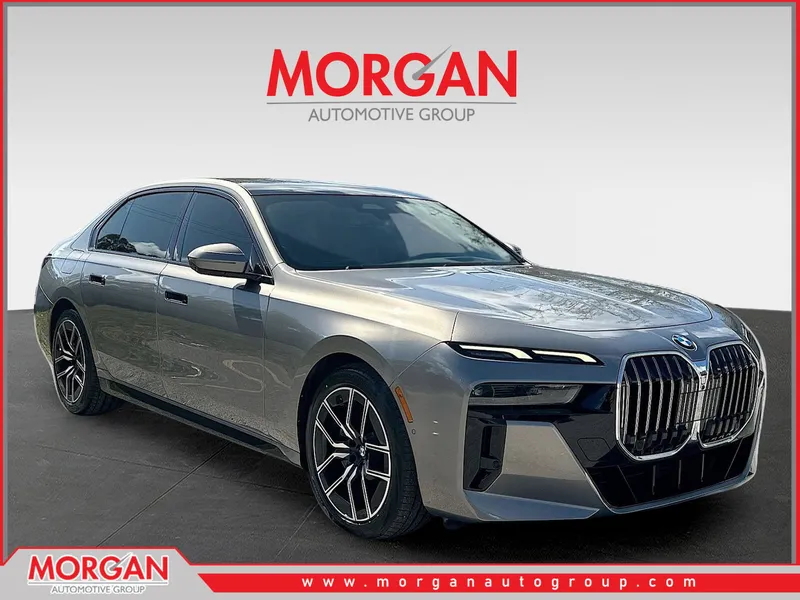 2023 BMW 7 Series 740i in Oxide Grey Metallic — front three-quarter view