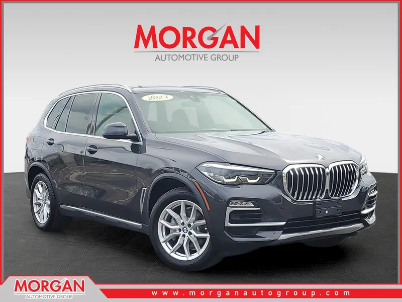 2021 BMW X5 xDrive40i in Dark Graphite Metallic — front three-quarter view