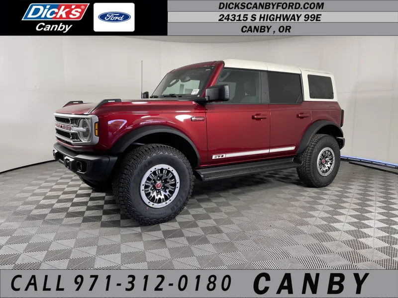 2026 Ford Bronco Outer Banks in Ruby Red Metallic Tinted Clearcoat — front three-quarter view