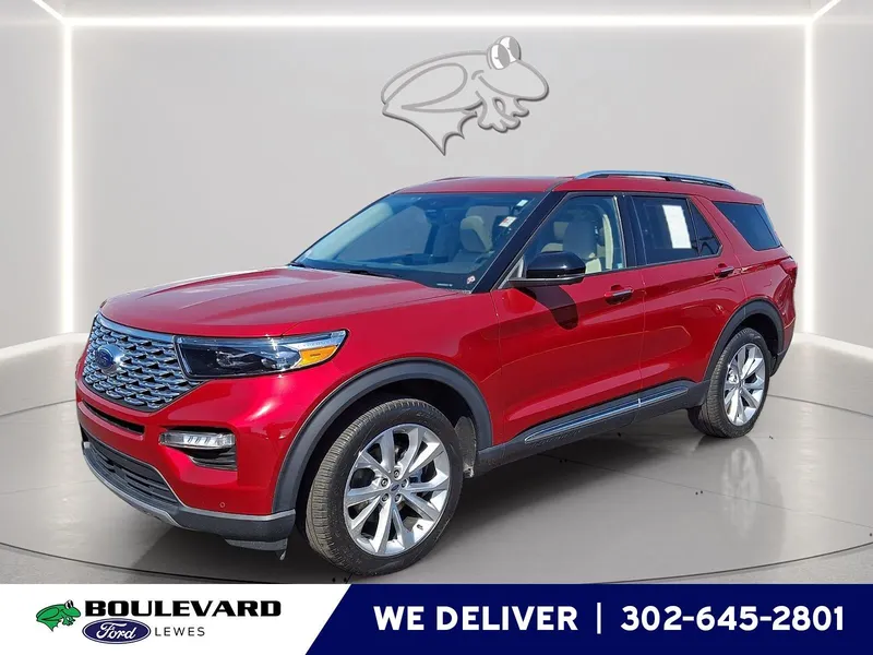 2022 Ford Explorer Platinum in Rapid Red Metallic Tinted Clearcoat — front three-quarter view