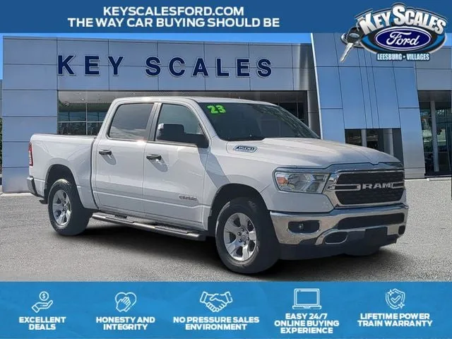 2023 RAM 1500 Big Horn/Lone Star in Bright White Clearcoat — front three-quarter view
