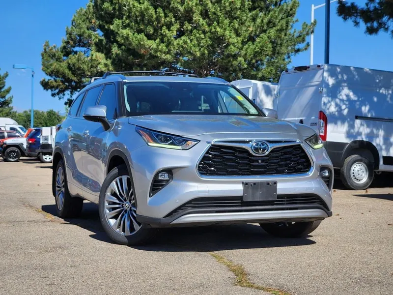 2021 Toyota Highlander Platinum in Celestial Silver Metallic — front three-quarter view