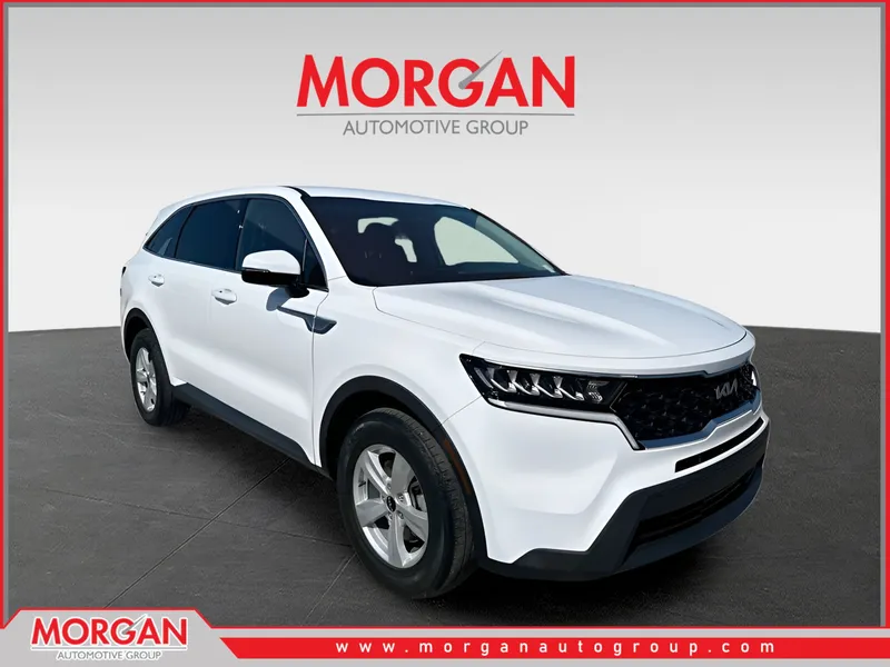 2023 Kia Sorento LX in Glacial White Pearl — front three-quarter view