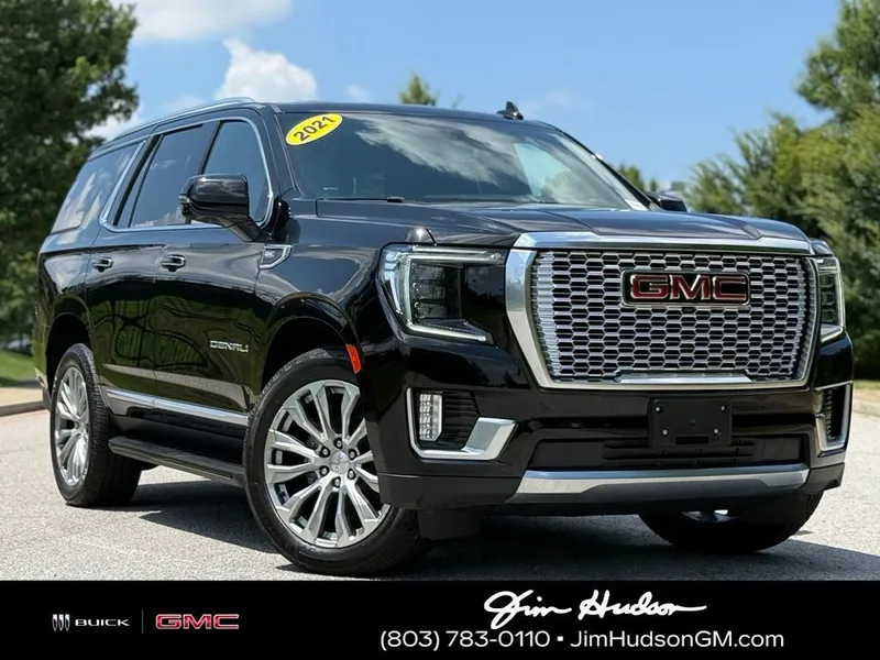 2021 GMC Yukon Denali in Onyx Black — front three-quarter view