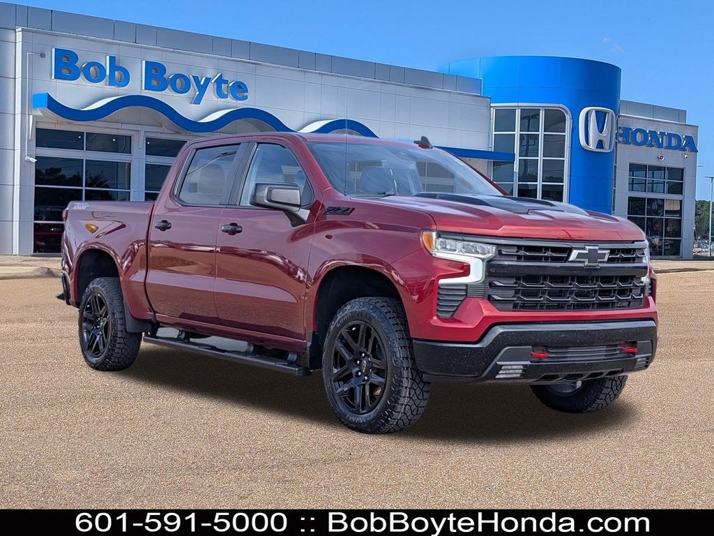 2023 Chevrolet Silverado 1500 LT Trail Boss in Radiant Red Tintcoat — front three-quarter view