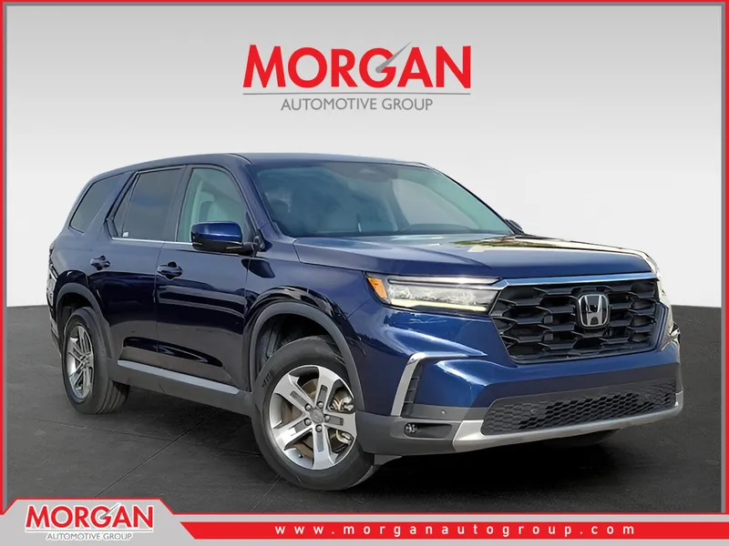 2024 Honda Pilot EX-L 7 Passenger in Obsidian Blue Pearl — front three-quarter view