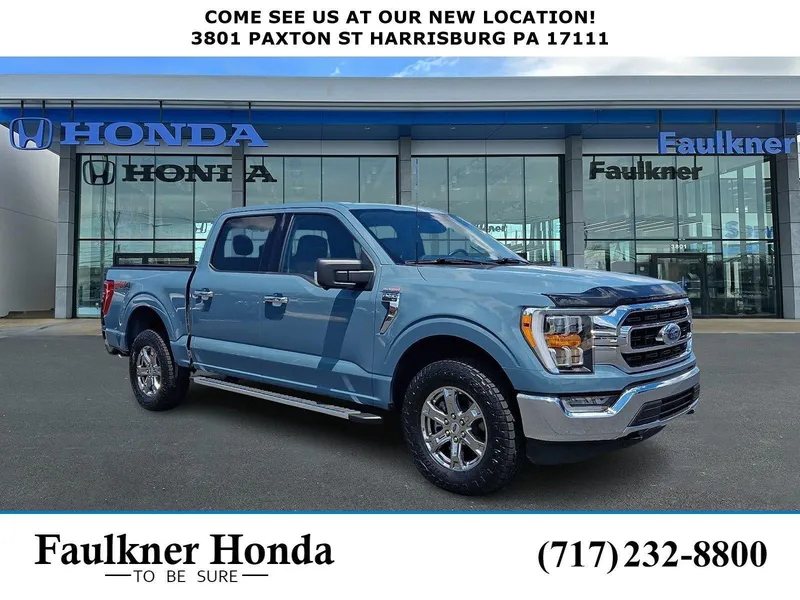 2023 Ford F-150 XLT 4WD SuperCrew 5.5' Box in Area Blue — front three-quarter view