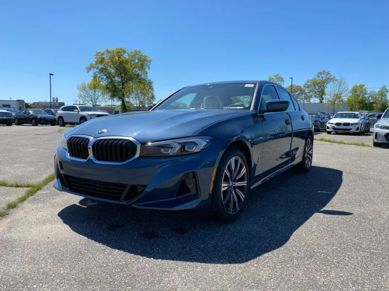 2026 BMW 3 Series 330i xDrive in Arctic Race Blue metallic — front three-quarter view