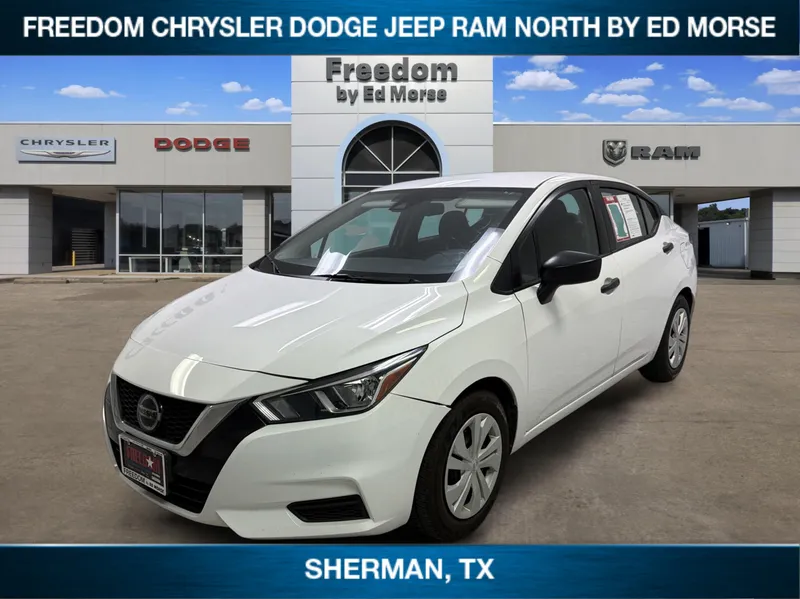2022 Nissan Versa S in Fresh Powder — front three-quarter view